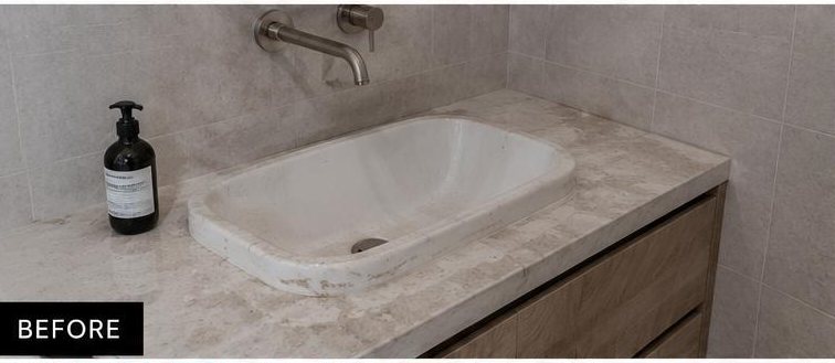 Bathroom vanity and basin before cleaning — staining and grime across the stone top and basin